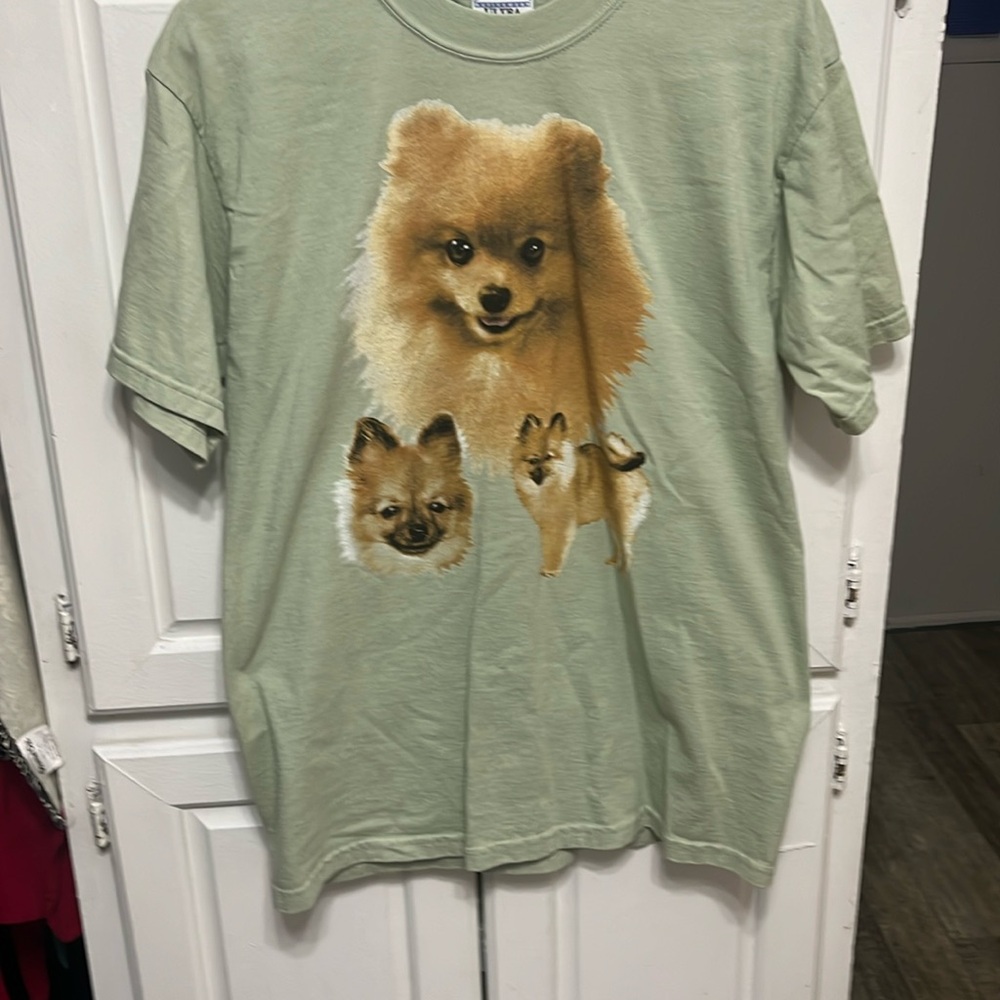 NWOT. Light green T-shirt with Pomeranian prints.